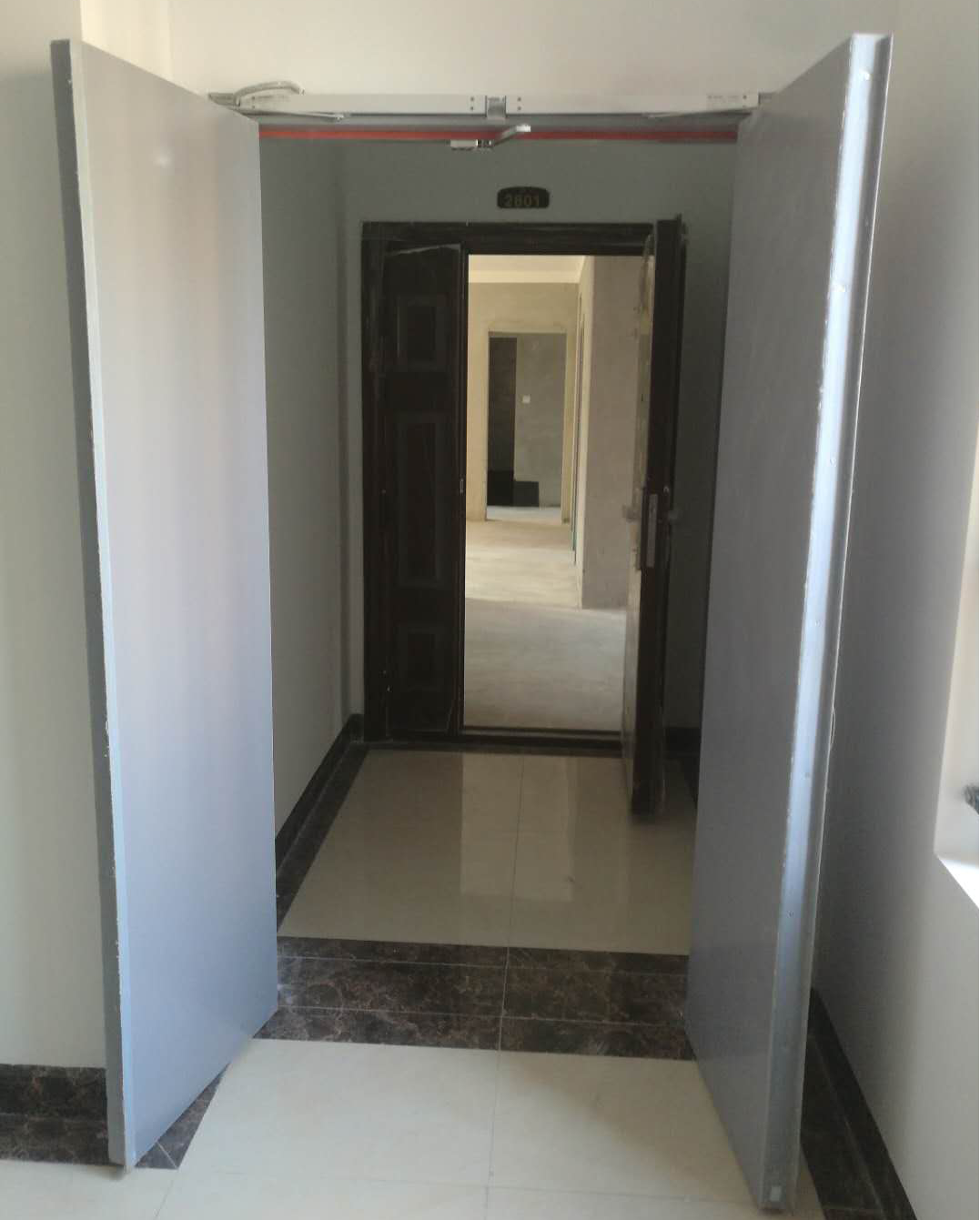 雙常開防火門電動(dòng)閉門器安裝現(xiàn)場圖 雙常開防火門電動(dòng)閉門器安裝現(xiàn)場圖